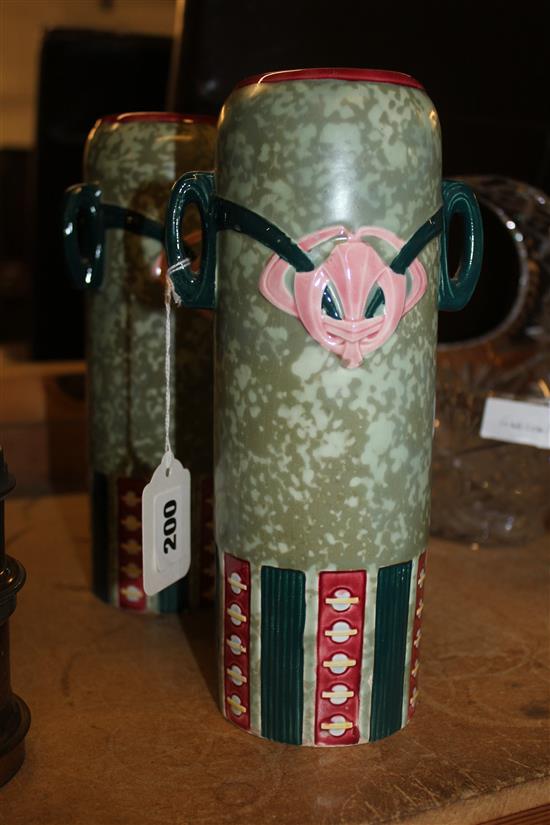 Pair of early 20C Royal Dux Secessionist cylindrical vases, with twin small loop handles